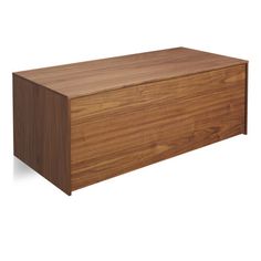 a large wooden box sitting on top of a white surface