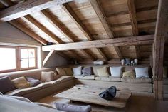 an old attic with wood floors and exposed beams