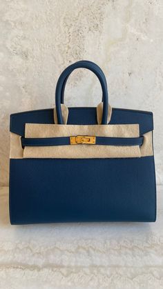 *The bag comes in full set with original store receipt. High-end Blue Office Bags, Luxury Blue Bags For Business, Luxury Blue Business Bags, Classic Blue Bag With Original Box, Blue Epsom Leather Bag With Gold-tone Hardware, Blue Epsom Leather Top Handle Bag, Blue Epsom Leather Rectangular Bag, Blue Epsom Leather Business Bag, Luxury Blue Epsom Leather Bag