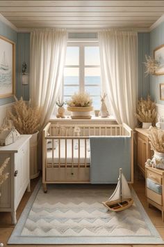 a baby's room with a sailboat in the crib and sea grass on the floor