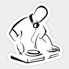 a black and white sticker of a person djing on a turntable with headphones