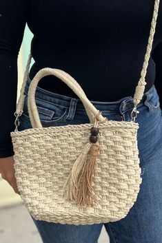 Cute small straw boho beach bag with shoulder strap. Dimensions: 7.5” x 11” Beige Shoulder Bag With Braided Handles For Day Out, Braided Tote Shoulder Bag For Beach Season, Cream Bohemian Shoulder Bag For Beach Season, Bohemian Cream Shoulder Bag For Beach Season, Beach Season Beige Crossbody Bucket Bag, Casual Straw Crossbody Beach Bag, Chic Beige Braided Beach Bag, Beige Crossbody Bucket Bag For Beach Season, Beach Bag With Braided Details In Beige