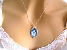 "Real Cameo Necklace, New Mom Gift, Mother and Child Cameo Necklace Sterling Silver Carved Agate, Blue Cameo Necklace, Cameo Jewelry Jewellery I love the sweetness in this beautiful genuine carved agate Victorian Mother/Child cameo necklace. The pendant is a neoclassical woman and child against a blue background. This is the real thing - carved from agate stone, and is framed in sterling silver hanging on a sterling silver chain. Length: your choice - 16 to 30 inches Pendant: 1.38 inches (18 x 1 Blue Cameo Necklace For Wedding, Blue Cameo Jewelry For Wedding, Blue Cameo Jewelry For Formal Occasions, Formal Blue Cameo Jewelry, Blue Cameo Necklace For Formal Occasions, Victorian Mother, Cameo Jewelry, Mother Child, Cameo Necklace