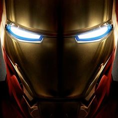 an iron man helmet with glowing eyes is seen in this poster for the upcoming film