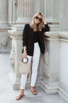 Black blazer, a black bodysuit, white jeans, brown sandals, a straw bag and black cat eye sunglasses. Spring outfit, summer outfit, simple outfit, black and white outfit, easy outfit, fashion 2018, fashion trends 2018, street style, casual outfit, work outfit #fashion2018 #streetstyle #springstyle #summerstyle #casualstyle #blazer #hermes #stylish #fashiontrends2018 Mode Over 50, Fashion Vest, Black And White Outfit, Summer Work Outfits, Outfit Jeans, Mode Inspo, Fashion 2018