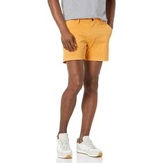 Upgrade your summer wardrobe with these sleek Slim Fit Flat Front Chino Shorts. Crafted from a soft and durable cotton blend with a touch of elastane, these shorts offer a comfortable fit with just the right amount of stretch. With a button closure and button-through back pockets, they are both stylish and functional. Details: 98% Cotton, 2% Elastane Button closure Machine Wash Fitted through hip and thigh, with a tapered leg. Sits below the waist Soft, durable cotton blend with a gentle stretch Casual Elastane Bottoms For Beach, Casual Elastane Beach Bottoms, Summer Stretch Cotton Bottoms, Stretch Cotton Summer Bottoms, Fitted Cotton Beach Shorts, Solid Color Cotton Bermuda Shorts For Beach, Solid Cotton Bermuda Shorts For Beach, Relaxed Fit Cotton Shorts For Warm Weather, Relaxed Fit Cotton Bottoms For Warm Weather