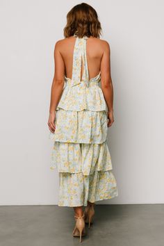 A perfect piece for those fun-in-the-sun moments and memories Off white with yellow, blue, and green floral print Chiffon material has no stretch Plunge halter neck with self-tie Open back style Inverted V waistline Elastic waistband Tiered skirt that is lined until bottom tier Self and Lining: 100% Polyester Marianne is 5'6, cup size 34D, size 6 and wearing size S Baltic Born, Green Floral Print, Floral Print Chiffon, Chiffon Material, Denim Romper, Print Chiffon, Tier Skirt, Tiered Skirt, Tiered Dress