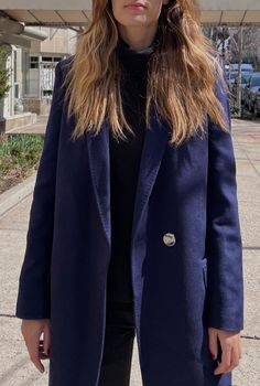 The perfect navy blue wool coat. Its loose fit is ideal for layering. A chic alternative to keep warm. It is lightweight and warm, making it the perfect transeasonal wool coat. The Navy blue tone is very chic, specially when worn with black or neutral colors. Great freedom for styling! 100% super soft wool Deep pockets with flap details Gun metal buttons in front and sleeves Fully lined in 100% silky viscose fabric Take your normal size, fit runs slightly loose Winter Wool Blazer For Layering, Trendy Wool Blazer For Work, Chic Notch Lapel Outerwear For Everyday, Chic Everyday Outerwear With Notch Lapel, Chic Navy Wool Outerwear, Chic Wool Outerwear For Layering, Blue Wool Pea Coat With Notch Lapel, Chic Wool Peacoat For Workwear, Oversized Navy Outerwear For Work