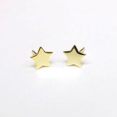 These plain, minimalist sterling silver star earrings are suitable for daily wear. At about 8 mm wide ( 0.3 inch) they are well sized to suit a wide range of wearers and age groups. Available in sterling silver and gold over sterling silver with matching sterling silver push back. Minimalist Star-shaped Tarnish Resistant Earrings, Minimalist Yellow Gold Star Earrings, Gold Star-shaped Minimalist Earrings, Minimalist Gold Star Earrings, Sterling Silver Star Earrings, Silver Star Earrings, Star Earrings Stud, Star Studs, Silver Stars