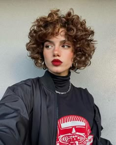 Curly Bobs Are The Versatile Haircut Taking Over Instagram Neutral Olive Skin Tone Hair Colors, Short Curly Butterfly Haircut, Short Round Curly Haircut, Short Curly Layered Haircuts, Short Hair Perm Pixie Cuts, Short Hairstyle Women Curly Hair, Natural Curly Pixie Cut, Natural Curly Hair Mullet, Pixie Curly Haircuts