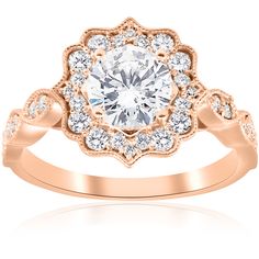 a rose shaped diamond engagement ring set in 18k gold with diamonds around the band