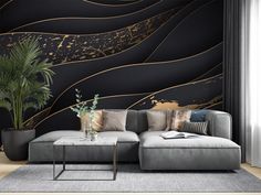 a modern living room with black and gold wallpaper