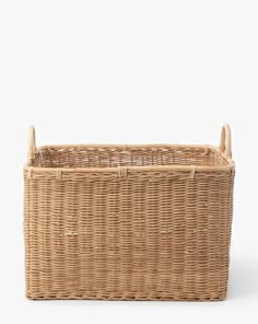 an empty wicker basket with handles