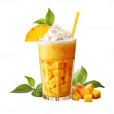 a glass filled with ice cream and mango slices