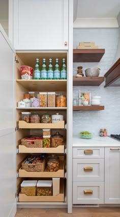 an open pantry with lots of food in it