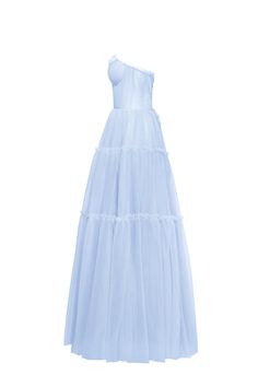 Dreamy tulle dress in light blue color with a light ruffled tulle maxi skirt. This dress has a heart-shaped boned semi-transparent bodice with built-in cups and a corset back, which makes the silhouette fitted and elegant. The A-line maxi skirt is made from multiple layers of delicate tulle that emphasize the hourglass silhouette. The waistline is adorned with a silver belt with Milla’s signature. Details: Material: Tulle Fabric composition: 100% Polyester, 100% Nylon Sleeve style: Sleeveless Silhouette: A-line Skirt length from waist: 116 cm / 45.6 inches Dress weight: 1.14 kg / 2.5 lbs Neckline: Heart-shaped neckline Back: Lacing closure Lining: Light blue full-length flared underskirt Model is: 180 cm / 83-60-95, wearing size S Art.N.: 9000-10 Light Blue Asymmetrical Dress Casual, One Shoulder Dress Long, Tulle Maxi Dress, Tulle Maxi Skirt, Hourglass Silhouette, Dress Trendy, Dress Weights, Rush Dresses, Wedding Guest Style