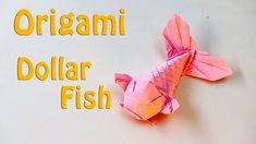 the origami dollar fish is made out of pink paper and yellow text reads, origami dollar fish