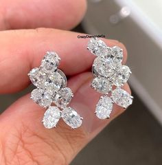 Classy Cluster Earrings With Oval Diamond, 4.9 TCW Oval Cut Lab Grown Diamond Stud Earrings, Screw Back Wedding Earrings, Moissanite Earring ✹✹𝐖𝐞𝐥𝐜𝐨𝐦𝐞 𝐭𝐨 𝐂𝐫𝐚𝐳𝐲𝐃𝐢𝐚𝐦𝐨𝐧𝐝𝐬𝐂𝐨✹✹ Detail about stones Moissanite & Simulated Stone: ----------------------------- Stone Shape: Oval Cut Stone Size: 5X4 mm Weight: 4.90 TCW Color: Colorless Cut: Excellent Clarity: VVS Lab-Grown Diamond & Natural Diamond: ----------------------------- Stone Shape: Oval Cut Stone Size: 5X4 mm Weight: 4.90 TCW Color: FG Cut: Excellent Clarity: VS-SI ★ 𝑰𝒕𝒆𝒎 𝑫𝒆𝒕𝒂𝒊𝒍𝒔:- ☛ Metal Purity: Solid Gold (10KT, 14KT, 18KT); Silver(925 Sterling, 935 Argentium), 950 Platinum ☛ Metal Tone: Yellow, White, Rose ☛ Stamp/Hallmark: Yes ★ 𝑪𝒖𝒔𝒕𝒐𝒎𝒊𝒛𝒂𝒕𝒊𝒐𝒏:- ☛ Customized Design Jewelry. ☛ All cuts whic Luxury Round Cut Cluster Earrings With Lab Grown Diamonds, Luxury Classic Oval Diamond Earrings, Luxury Oval Cluster Earrings For Gift, Formal Oval Bridal Earrings With Brilliant Cut, Oval Brilliant Cut Wedding Earrings, Oval Diamond Bridal Earrings For Anniversary, Oval Diamond White Bridal Earrings, Oval Brilliant Cut Earrings For Wedding, Oval Diamond Bridal Earrings For Wedding