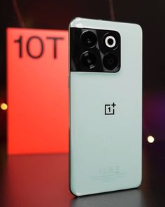 oneplus camera attached to the back of an iphone