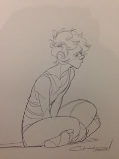 a drawing of a boy sitting on the ground