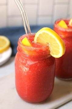 strawberry lemonade vodka slushies in mason jars