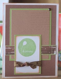 a close up of a card with a bow on the front and back of it