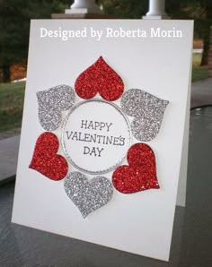 a valentine's day card with glitter hearts