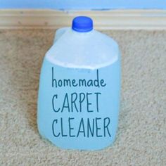 a blue plastic bottle with the words home made carpet cleaner on it