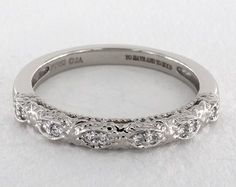 an antique style diamond wedding band