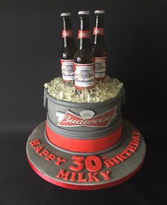 a birthday cake made to look like a bucket full of beer