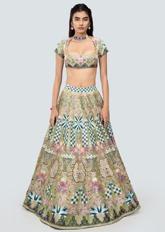 Multicolored green heavy embellished and applique kali tissue lehenga with blouse and scallop net dupatta. Bollywood Style Embellished Green Anarkali Set, Green Embellished Semi-stitched Anarkali Set, Green Embellished Sets For Navratri, Anarkali Embellished Green Choli, Green Embellished Anarkali Choli, Green Embellished Traditional Wear For Navratri, Embellished Green Traditional Wear For Navratri, Green Embellished Designer Traditional Wear, Anarkali Style Embellished Green Choli