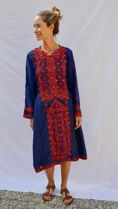 Love this beautiful ethnic, caftan style dress.  It's comfortable without being frumpy.  The color combination is fresh and fun.  The embroidery down the front makes the dress and gives it that ethnic feel.  Great to pack for a vacation or to wear around the house or for a summer evening party. Traditional Blue Kaftan For Navratri, Blue Bohemian Dress For Navratri, Bohemian Blue Dresses With Geometric Embroidery, Blue Bohemian Dress With Geometric Embroidery, Blue Bohemian Embroidered Dress For Festive Season, Bohemian Embroidered Dress With Geometric Embroidery For Festivals, Traditional Blue Dress With Geometric Embroidery, Blue Dress With Embroidered Border For Festival, Blue Bohemian Dress With Traditional Patterns