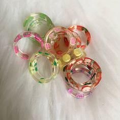 Set Of 12 Acrylic Fruit Rings -All Brand New Never Worn -Size Unknown But My Ring Finger Is A 6.5 And They Only Fit On There Casual Handmade Rings As Gifts, Casual Handmade Ring As Gift, Handmade Multicolor Summer Ring, Trendy Clear Round Rings, Cute Multicolor Round Rings, Trendy Multicolor Plastic Rings, Handmade Cute Green Ring, Handmade Cute Green Rings, Cute Multicolor Rings For Gift