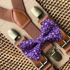 This dark purple floral bow tie & vegan leather brown suspenders set is a great choice for grape or eggplant wedding colors, groomsmen gift, Amethyst weddings, plum ring bearer outfit, birthday celebration or any other special occasion.  **Please Specify**  Bow Tie Only (w/ Clip or Neck Strap), Suspenders Only, or Bow Tie Only & Susp (Bow Tie and Suspenders) SUSPENDERS- One Pair of our Quality Suspenders BOW TIE - One Bow Tie on White Adjustable STRAP or Alligator CLIP PET BOWTIE w/ Elastic Loop Classic Purple Adjustable Suit And Tie Accessories, Wedding Colors Groomsmen, Eggplant Wedding Colors, Eggplant Wedding, Brown Suspenders, Tie And Suspenders, Yellow Bow Tie, Purple Bow Tie, Amethyst Wedding