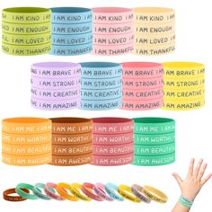 i am brave wristbands with different sayings on them and one hand in the middle