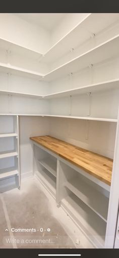 an empty room with shelves and shelving in it