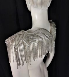 We make and ship our items really fast if you need it for a specific date please let us know. or call/text us at 954-3051817 to complete your order over the phone Exquisite jewelry grade style crystal epaulet wit a heavy rhinestone and glass beaded shoulder pieces Made with sparkling crystals and rhinestones in an ornate pattern of swirls and scrolls this crystal beaded epaulets boasts a classic design that' is a perfect complement for a one of a kind outfit. Beautifully crafted from only the be Silver Embellished Bridal Accessories For Evening, Party Crystal Embellished Bridal Accessories, Silver Embellished Bridal Accessories, Glamorous Silver Bridal Accessories For Evening, Fitted Rhinestone Bridal Accessories For Party, Fitted Bridal Accessories With Rhinestones For Party, Silver Rhinestone Bridal Accessories For Formal Occasions, Silver Rhinestone Bridal Accessories For Evening, Silver Crystal Bridal Accessories For Party