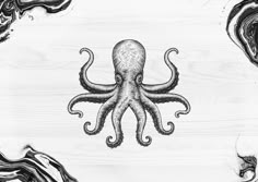 an octopus drawing on wood with black ink