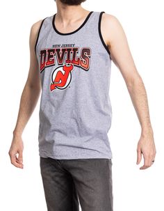 The Originals Collection Be prepared for anything this summer in this Devils Gradient Print Tank Top! This NHL Licensed tank top is perfect for any task you may have going on that day. Made from 100% cotton, this comfortable tank top comes with your favorite team's logo screen printed onto the shirt! Officially Licensed NHL Product comes with Authentic Hangtags Devils font features a gradient effect 100% Cotton Sporty Cotton Tank Top With Graphic Print, Casual Racerback Tank Top With Letter Print, Casual Cotton Racerback T-shirt, Crew Neck Cotton Tank Top For Sports, Sporty Cotton Racerback Muscle Tee, Casual Cotton Racerback Tank Top, Basic Cotton Sports Top, Casual Cotton Tank Top For Gym, Cotton Racerback Sports Tops