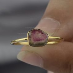 Watermelon Tourmaline Ring By Sushila Jewelry/ 14K Solid Gold Ring/ Bi Color Gemstone Ring/ Genuine Tourmaline Jewelry/ Birthday Gift Ideas NOTE: These Bío Tourmaline gemstones, sourced from natural mines, exhibit inherent variations in both color and shape. As each gemstone is unique, so we will provide you with a stone selection to choose from. ≫ Features * Items Code: SPBR00781M  * Metal: 14K Solid Gold (18K also available - Additional fees may apply) * More options in gold color: Rose gold, yellow gold, White gold * Watermelon Tourmaline Weight: 0.63 Ct  * Ring Size:- 2 to 10 ( All sizes as per your request ) ≫ FAQ below for more detail. ✦ Sizing  We can adjust most items to fit your sizing preferences. Most items can be made to any size and length. Please leave a note at checkout or c Anniversary Solitaire Tourmaline Jewelry, Anniversary Tourmaline Solitaire Jewelry, Tourmaline Solitaire Jewelry As Gift, Tourmaline Solitaire Jewelry For Gift, Tourmaline Solitaire Jewelry Gift, Round Tourmaline Jewelry For Anniversary, Round Tourmaline Jewelry For Anniversaries, Round Stackable Tourmaline Jewelry, Tourmaline Gemstones For Gifts, Fine Jewelry Style