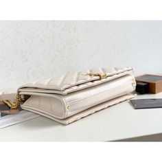 Size: 27cm*20cm*10.5cm It comes with Dust box, Care manual, Tag, and Paper bag. Rectangular Shoulder Bag With Original Box, High-end Beige Bag For Gift, High-end Beige Rectangular Flap Bag, Designer Beige Rectangular Case Bag, Luxury White Flap Bag As A Gift, White Luxury Flap Bag Perfect As A Gift, Luxury Rectangular Briefcase For Gift, Luxury Rectangular Briefcase As Gift, High-end Beige Rectangular Box Bag