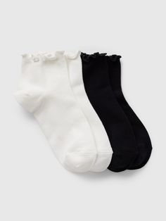 Soft, stretch ankle socks.  Ribbed, ruffled top.  Reinforced toe and heel.  This sock is made with 20% recycled polyester.  Compared to virgin materials, using recycled materials helps to reduce resource use and waste.  This product was made in a factory that invests in gender equality and women’s empowerment.  Through RISE Reimagining Industry to Support Equality) and Gap Inc. ’s program P. A. C. E.  Personal Advancement & Career Enhancement), we support people who make our clothes to build the Teen Ankle Socks, Winter Necessities, Romanticizing School, Ruffled Socks, Cute Pants, Support People, Brand Collaboration, Ruffled Top, Fame Dr