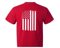 RED Remember Everyone Deployed Unisex Short Sleeve Shirt. In honor of our Deployed Service Members, this shirt is perfect for anyone and everyone! 'RED shirt Friday' is a tradition to show your support for our deployed military members. This two sided short sleeve shirt has RED on the front of the shirt with Remember Everyone Deployed as part of the letters. The back of the shirt has a distressed (weathered) looking flag. This is a red colored shirt with high quality white vinyl applied. Sizes a Patriotic Red Cotton T-shirt, Casual Red Shirt With American Flag Print, Red Short Sleeve Patriotic Shirt, Red Cotton T-shirt With Flag Print, Red American Flag Print Short Sleeve Shirt, Red Patriotic Cotton T-shirt, Red Cotton Patriotic T-shirt, Red Patriotic Cotton Shirt, Casual Red Shirt With American Flag