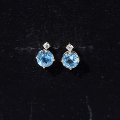 Product Details Add charm to your outfit with these Solitaire Earrings embellished with Round Cut Swiss Blue Topaz Solitaire and Round Brilliant Moissanite in prong setting. Crafted in Gold, the Women Stud Earrings come with Screw Back Closure to keep the Swiss Blue Topaz Earrings secure. These December Birthstone Earrings are perfect for casual or special occasions. Surprise your beloved with these Earrings as an Anniversary Gift and make their day memorable. Product Information SKU SHP-EARRING Fine Jewelry Topaz Earrings With Prong Setting, Blue Birthstone Earrings For Formal Occasions, Formal Blue Birthstone Earrings, Blue Diamond Round Cut Earrings, Blue Topaz Round Earrings For Anniversary, Fine Jewelry Birthstone Earrings In Topaz, Fine Jewelry Topaz Birthstone Earrings, Blue Topaz Earrings With Diamond Accents, Topaz Birthstone Earrings