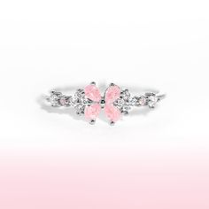 This ring is for everyone, but especially for all of our girly twirly pops! Our Bravissimo Ring adds the perfect amount of pink and sparkle to your stack! Pink Rings For Party, Pink Cute Rings For Anniversary, Feminine Pink Wedding Rings, Pink Feminine Rings For Anniversary, Elegant Pink Crystal Ring For Party, Feminine Pink Rings For Anniversary, Elegant Pink Flower Ring For Party, Cute Pink Round Rings, Pink Crystal Open Ring For Party