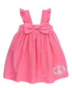 With flutter sleeves and over-sized bow detail, this dress is sure to turn heads! Elastic in the back gives just enough stretch to make on and off easy