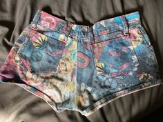 Excellent condition, purchased as vintage 1990s and worn twice.  100% cotton. Made in England. 29 inch waist. Please do get in touch in you have questions! Y2k High Waist Cotton Shorts, 90s Cotton Shorts For Streetwear, 90s Style Cotton Shorts For Streetwear, Retro Cotton Bottoms With Built-in Shorts, Y2k Cotton Short Bottoms, Y2k Cotton Bottoms Short Length, Y2k Style Cotton Bottoms For Summer, Multicolor Cotton Y2k Bottoms, Retro Multicolor Bottoms With Graphic Print