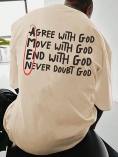 a man sitting down with his back to the camera wearing a shirt that says, free with god move with god end with god never doubt god