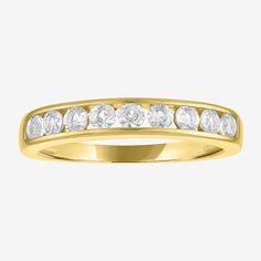 This Yes, Please! sparkling band offers an elegant everyday jewelry piece for incredible value. Crafted from 14K Yellow Gold Over Silver, this band comes channel set with 9 round-cut Lab-Grown White Sapphires. Ring Style: BandsFeatures: In A Gift BoxSetting: ChannelShape: RoundStone Cut: RoundMetal Color: YellowRing Gallery Height: 2.5mmBand Width: Care: Wipe CleanStone Type: 9 Lab Created SapphireAuthenticity: Lab Created StoneMetal: 14k Gold Over SilverCountry of Origin: Imported Classic Gold Stackable Channel Set Rings, Classic Gold Stackable Rings Channel Set, Gold Stackable Rings With Channel Set Round Cut, Gold Channel Set Stackable Rings With Round Cut, Yellow Gold Stackable Channel Set Rings, Yellow Gold Cubic Zirconia Eternity Band Channel Set, Gold Channel Set Stackable Rings For Anniversary, Gold Stackable Rings Channel Set For Anniversary, Classic 14k Gold Stackable Rings With Channel Set