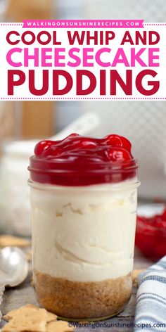 a jar filled with cheesecake pudding on top of a table